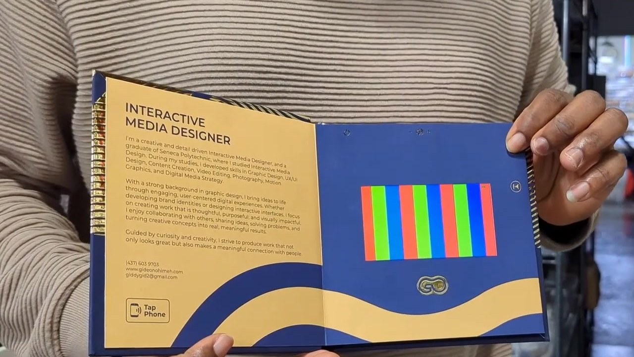 The videoBOOK open, with Gideon’s bio on the left and a video screen on the right