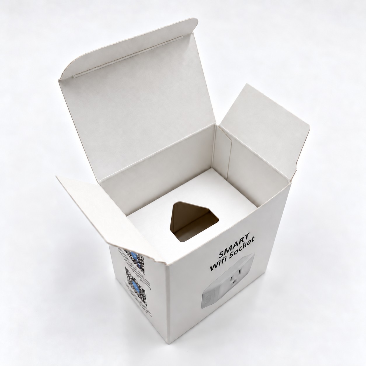 The globe smart socket box open from above, with the tray folded in and its cutout ready for the socket