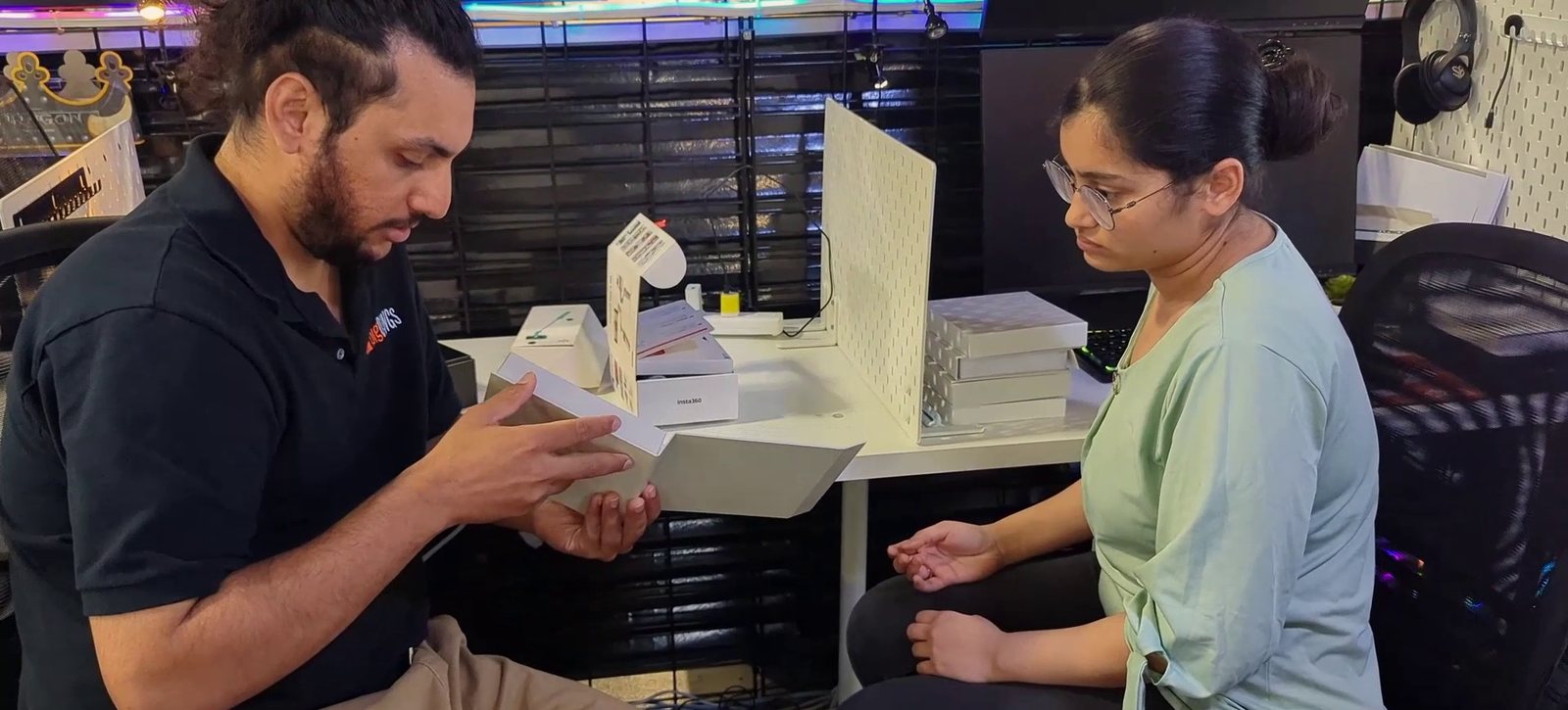 Karan going through a prototype box with the intern