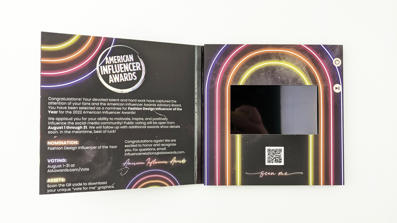 The American Influencer Awards video card open: the nominee letter on the left, the video screen and a QR code on the right