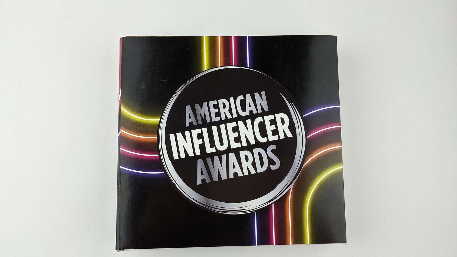 The printed mailer sleeve wrapped around the presentation box